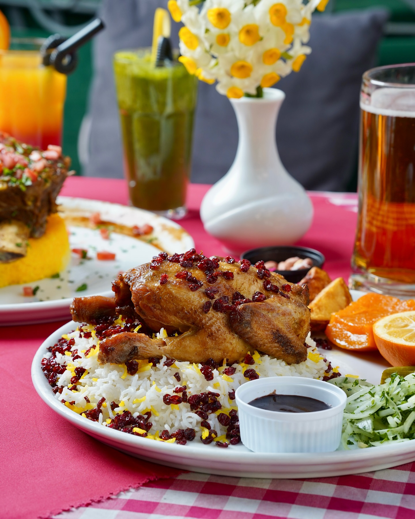 Roasted chicken with barberry saffron rice at Koohpaye