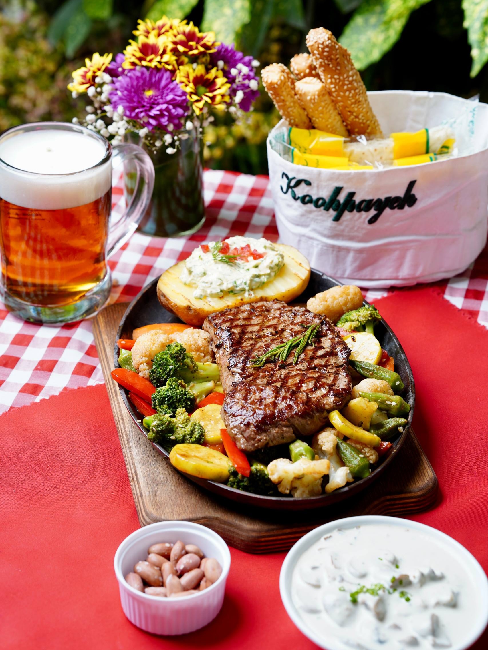 Grilled steak with vegetables at Koohpaye